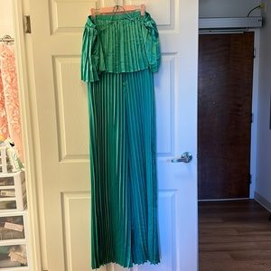 Flying tomato, green jumpsuit, extra large